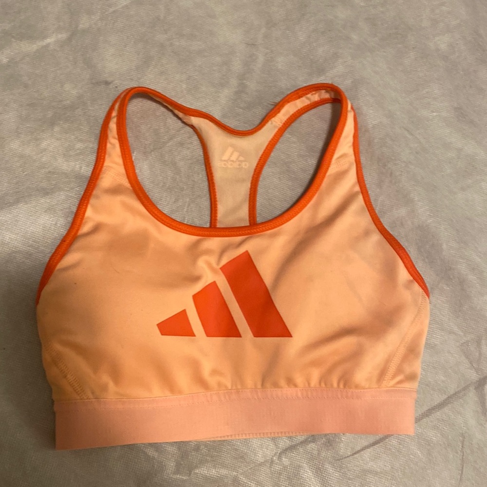 adidas sports bra, it's orange. nothing wrong with it just don't wear it
